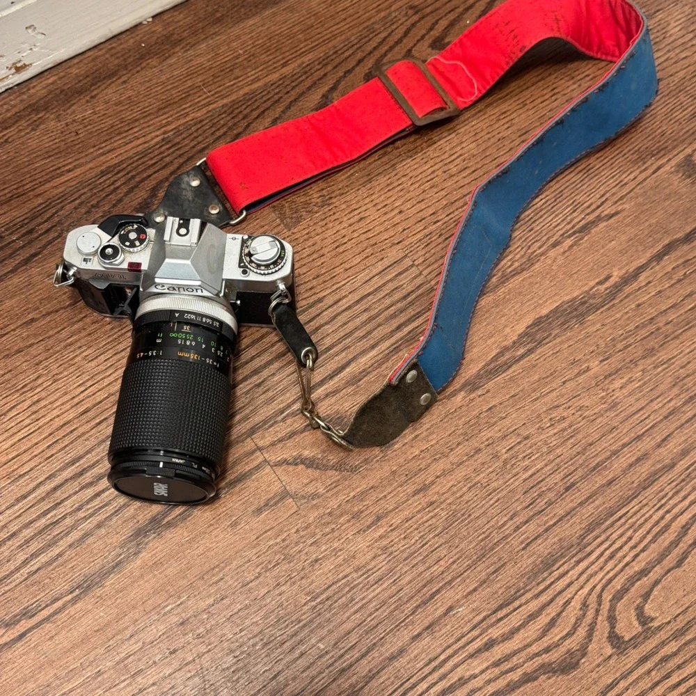 Canon AV 1 35mm SLR Film Camera Silver Sakar 35 135mm Lens Strap Untested